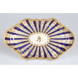 A Worcester spoon tray, circa 1765, of lobed hexagonal shape gilt with stylized foliage between
