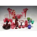 A mixed group of coloured glassware, 19th and 20th century, including two pairs of cranberry trumpet