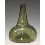 A Dutch green glass onion wine bottle, circa 1720-40, height 18.5cm, together with the Antique