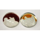 Two erotic glass paperweights, early 20th century, each engraved with a couple in a sexual act,