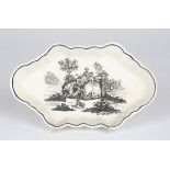 A Worcester black printed spoon tray, circa 1760, of lobed hexagonal form, decorated with a Robert