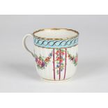 A Worcester fluted coffee cup, circa 1770, painted in Sèvres style with a variant of the Hop Trellis