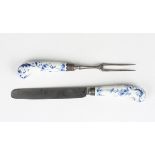 A pair of Worcester knife and fork handles, circa 1760-65, painted in blue with the Formal Daisy