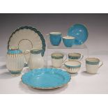 A Worcester porcelain turquoise glazed trio, circa 1770, painted in the workshops of James Giles,