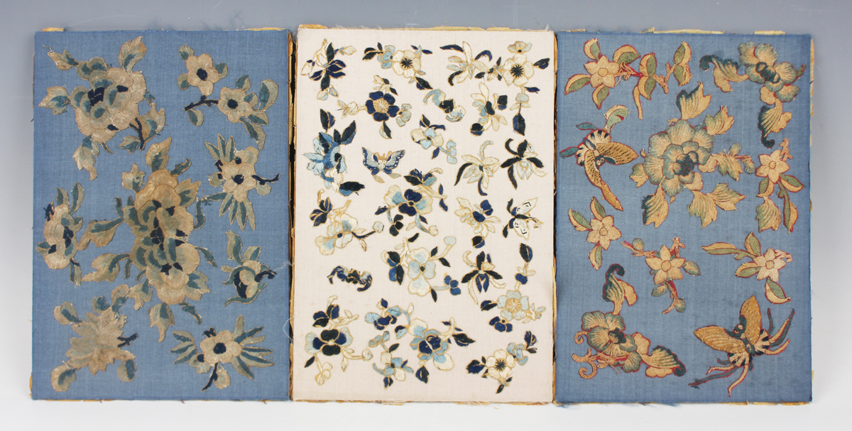 A group of three Chinese silk appliqué rectangular panels, late Qing dynasty, worked in coloured