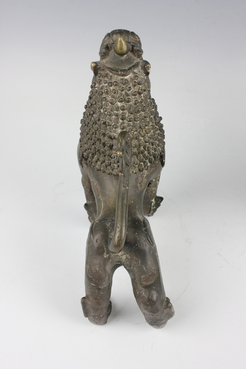 A pair of South-east Asian bronze models of Buddhistic lions, probably Nepalese, late 19th - Image 10 of 13