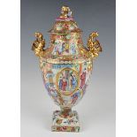 A Chinese Canton famille rose urn and cover, early 19th century, of neoclassical urn form, painted