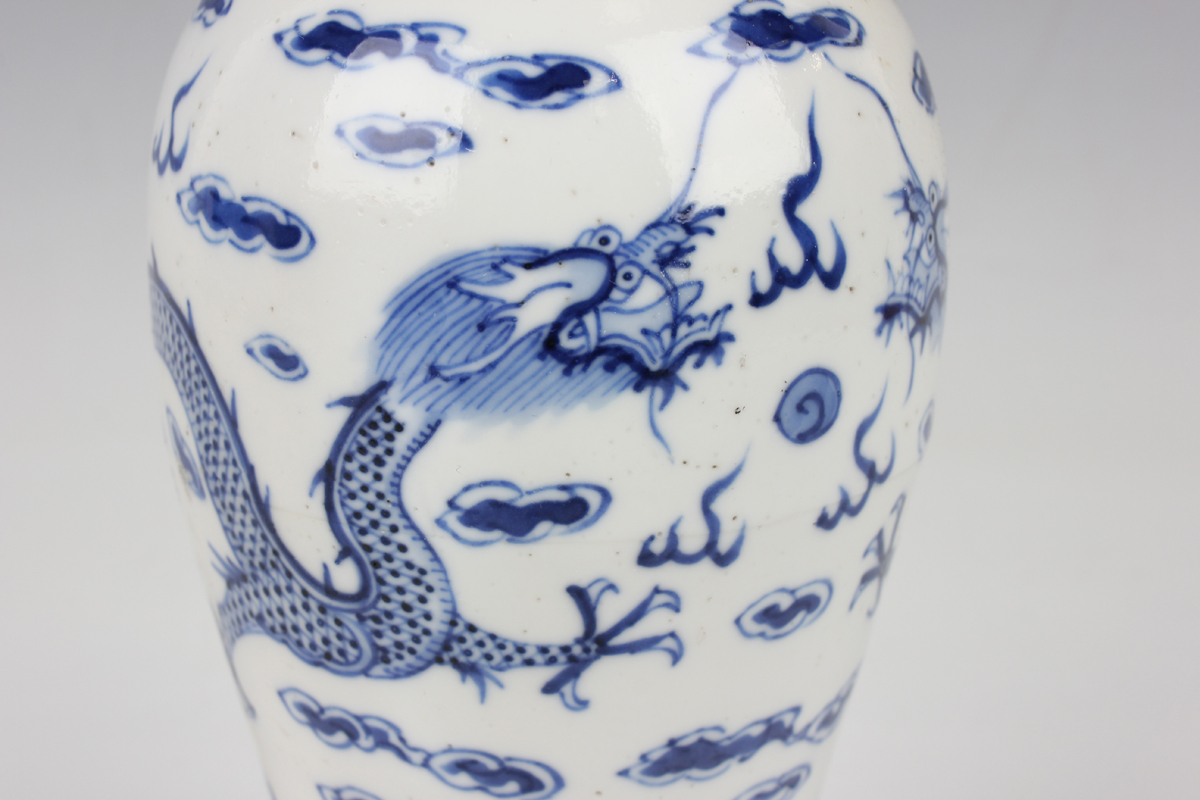 A Chinese blue and white porcelain vase, mark of Kangxi but late 19th century, the baluster body - Image 7 of 10