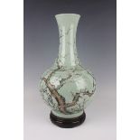 A Chinese celadon glazed porcelain bottle vase, mark of Guangxu but later, the globular body and