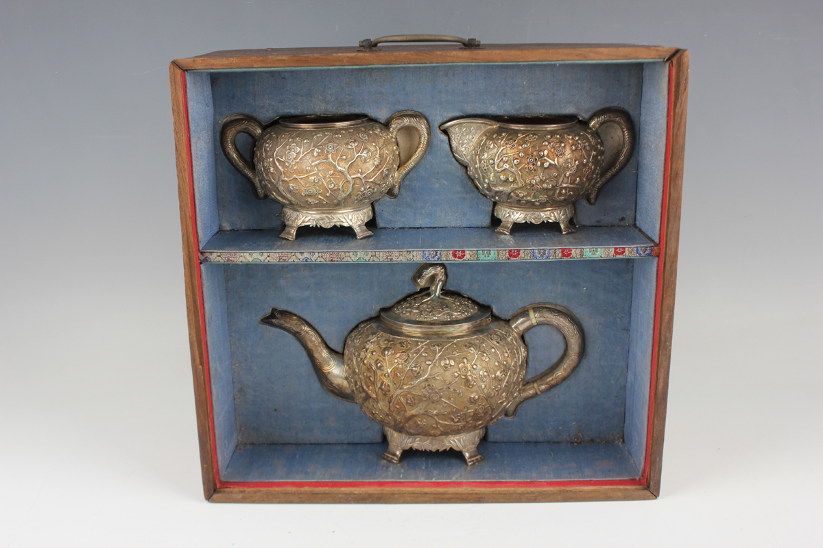 A Chinese export silver three-piece tea set by Wang Hing & Co of Hong Kong, late 19th/early 20th - Image 4 of 20