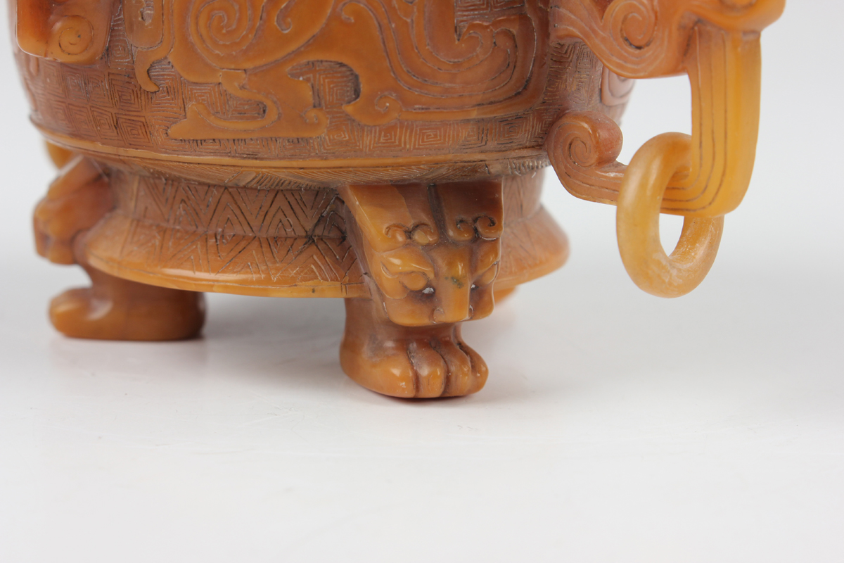 A Chinese archaistic butterscotch coloured soapstone tripod censer and cover, late Qing dynasty, the - Image 13 of 30