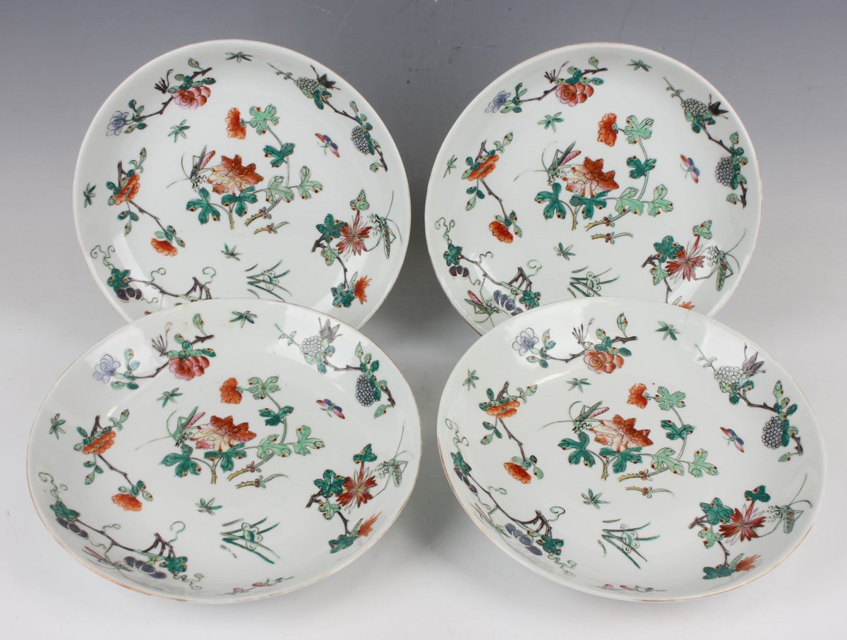 A set of four Chinese famille rose porcelain saucer dishes, mark of Jiaqing but 20th century, each