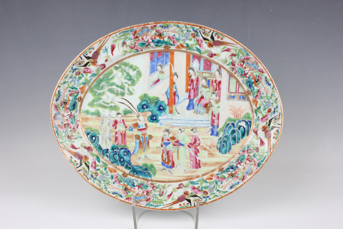 A Chinese Canton famille rose porcelain oval dish, mid-19th century, painted with a figural scene