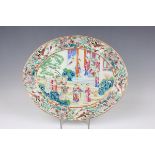 A Chinese Canton famille rose porcelain oval dish, mid-19th century, painted with a figural scene