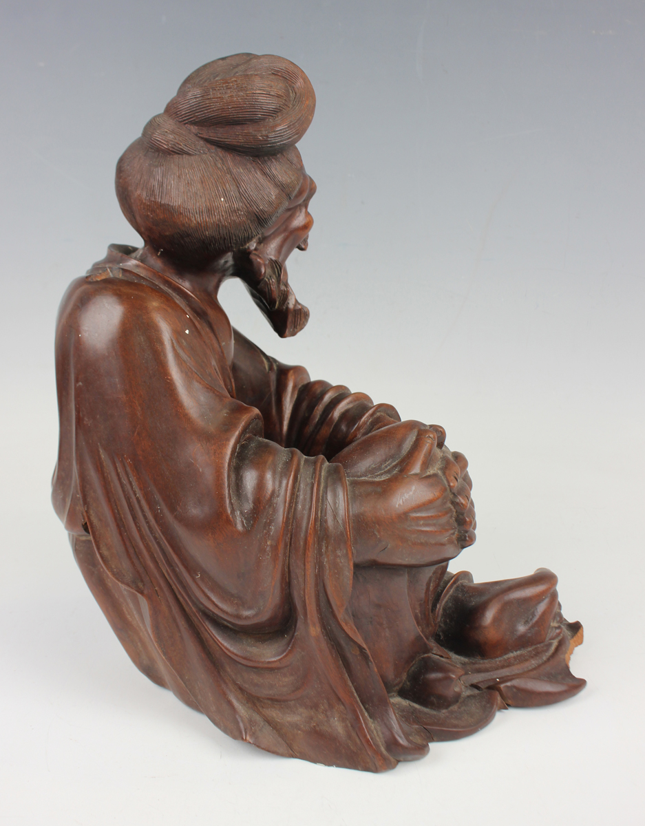 A Chinese hardwood figure of an elderly gentleman, early 20th century, modelled in a seated pose, - Image 12 of 15