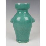 A Chinese green crackle glazed porcelain vase, late Qing dynasty, of baluster form with moulded lion