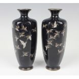 A pair of Japanese cloisonné vases, Meiji period, of hexagonal tapering form, each decorated with