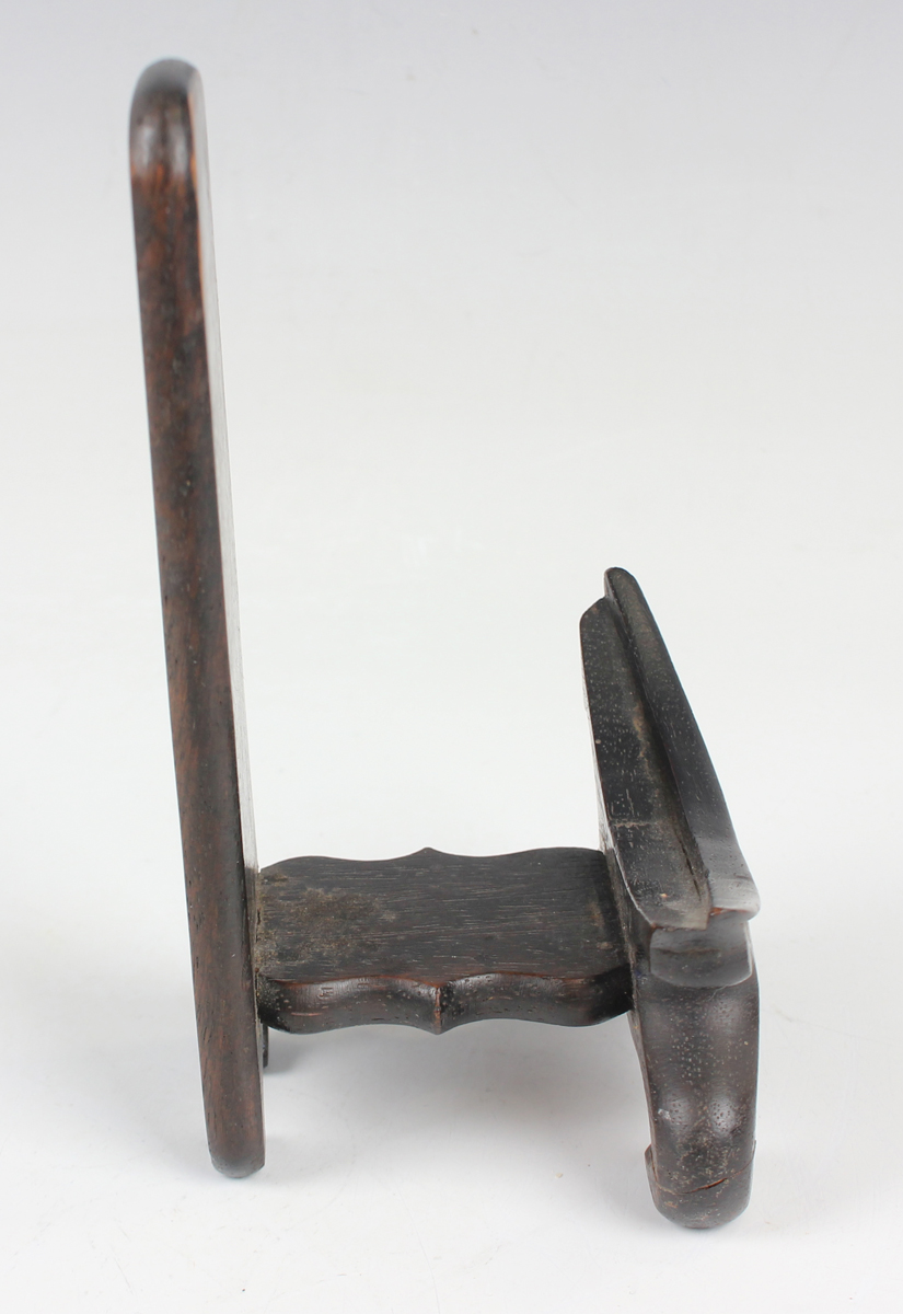 A Chinese hardwood figure of an elderly gentleman, early 20th century, modelled in a seated pose, - Image 2 of 15