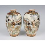 A pair of Japanese Satsuma earthenware vases by Keizan, Meiji period, each ovoid body painted and