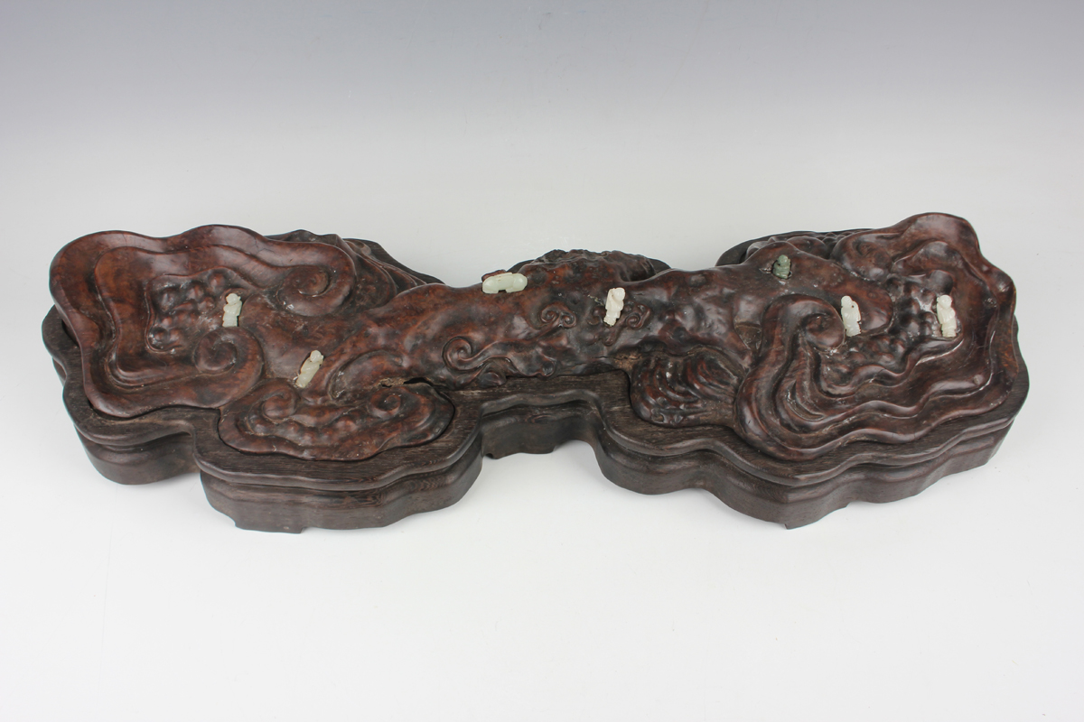 A Chinese hardwood carving, probably 20th century, modelled as a gnarled lingzhi fungus, inset