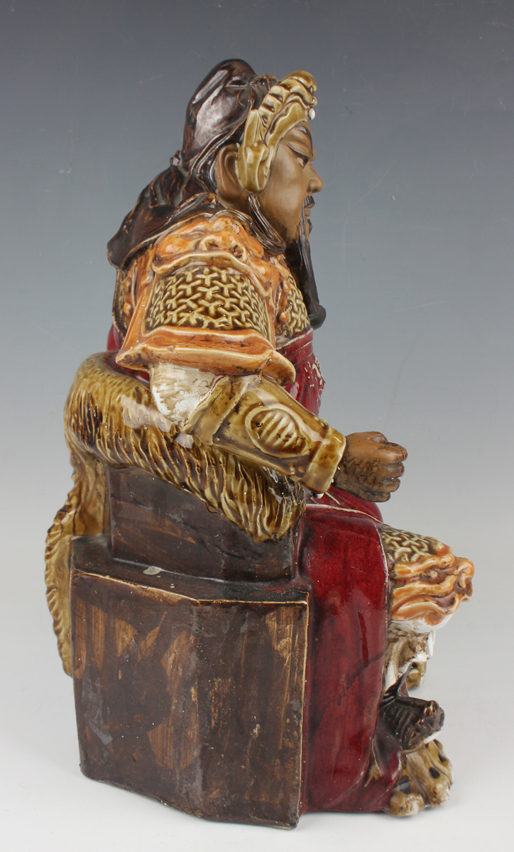 A Chinese Shiwan pottery sang-de-boeuf glazed figure of Guan Yu, mid-20th century, modelled seated - Image 6 of 7