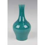 A Chinese turquoise glazed bottle vase, the baluster body with flared narrow neck, unmarked,