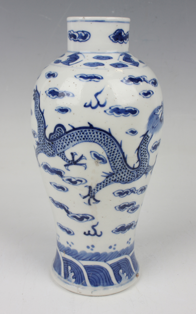 A Chinese blue and white porcelain vase, mark of Kangxi but late 19th century, the baluster body - Image 8 of 10