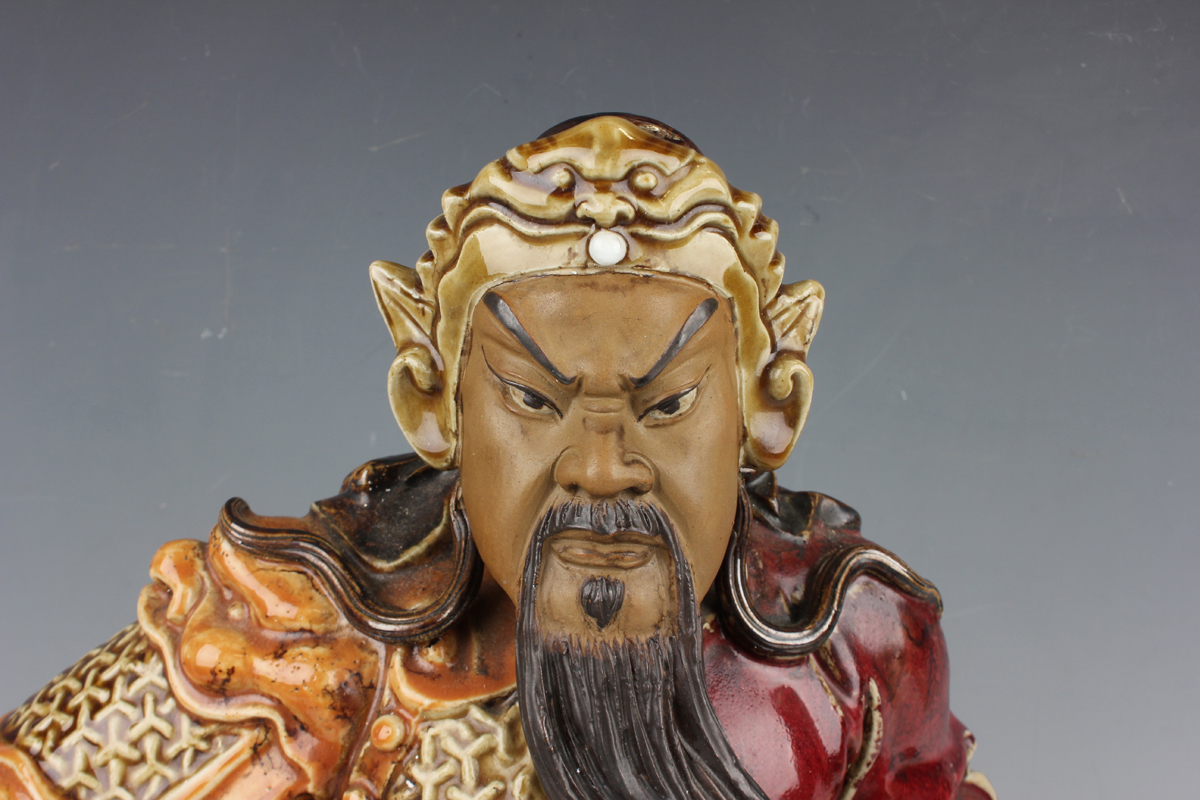 A Chinese Shiwan pottery sang-de-boeuf glazed figure of Guan Yu, mid-20th century, modelled seated - Image 7 of 7