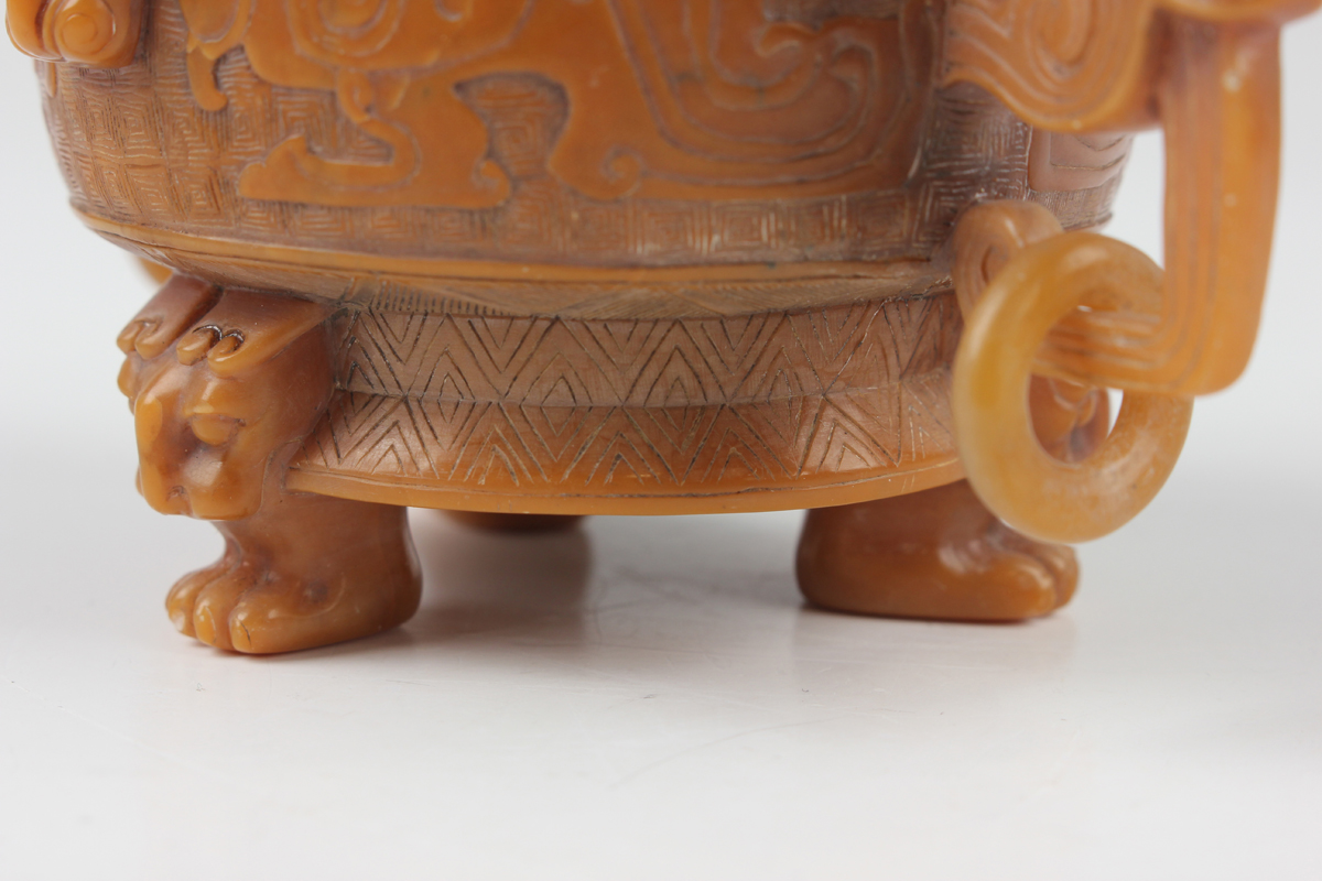 A Chinese archaistic butterscotch coloured soapstone tripod censer and cover, late Qing dynasty, the - Image 7 of 30