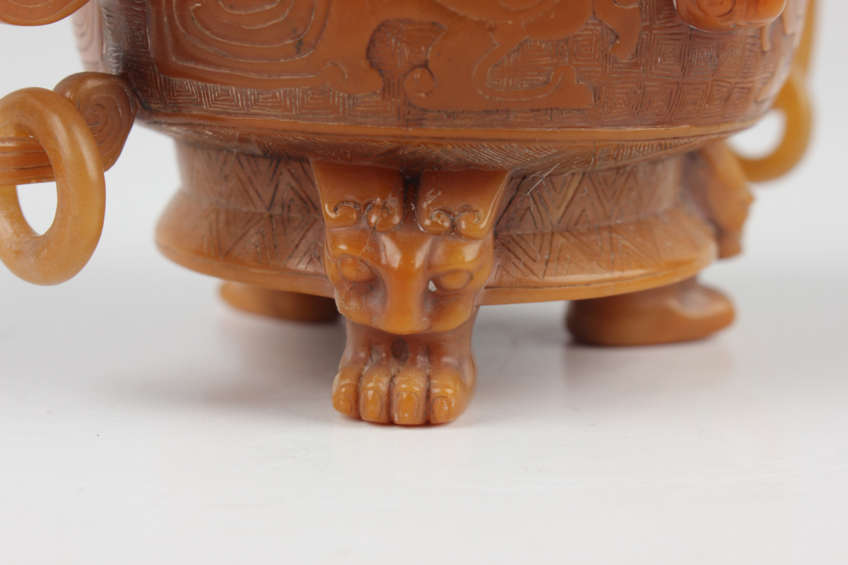 A Chinese archaistic butterscotch coloured soapstone tripod censer and cover, late Qing dynasty, the - Image 17 of 30