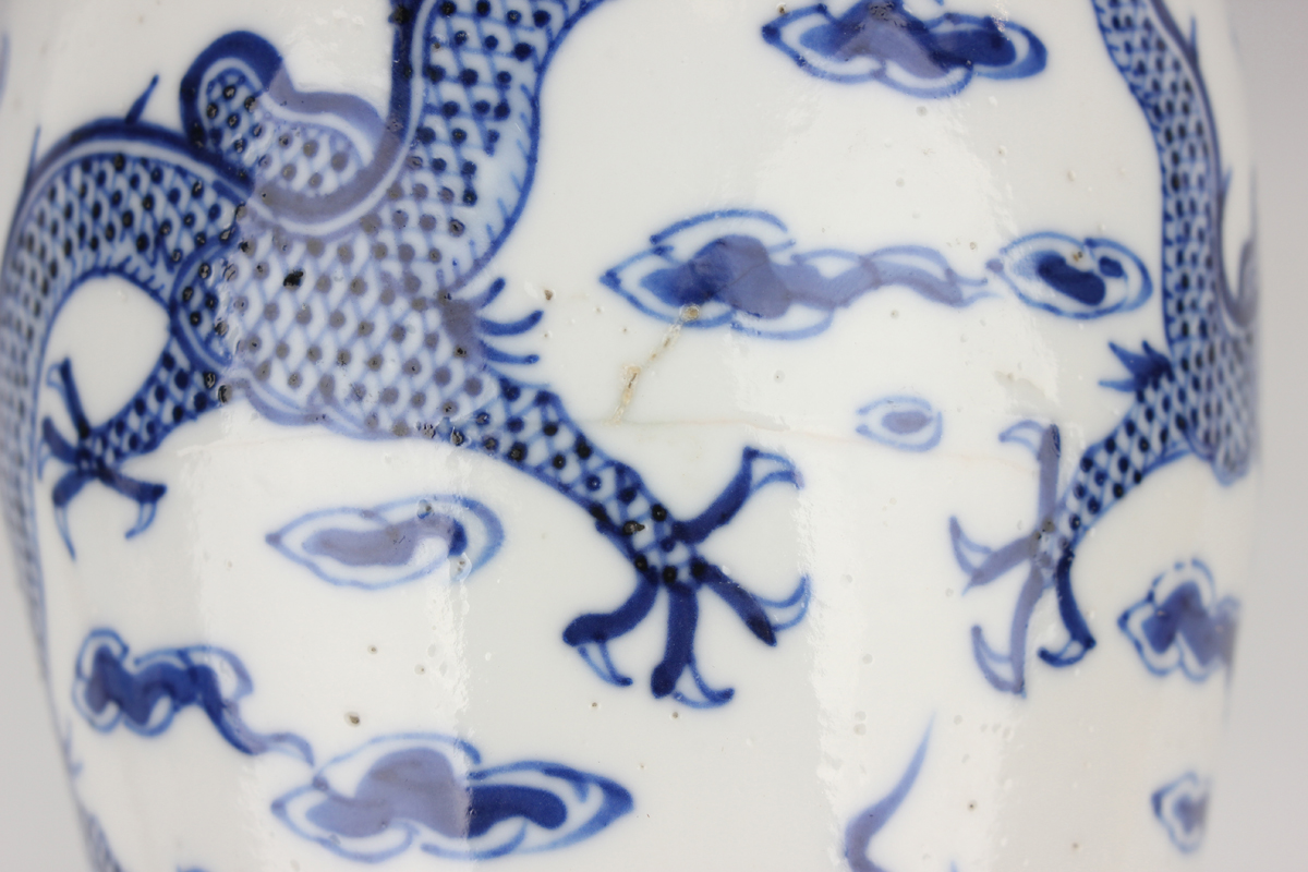 A Chinese blue and white porcelain vase, mark of Kangxi but late 19th century, the baluster body - Image 2 of 10