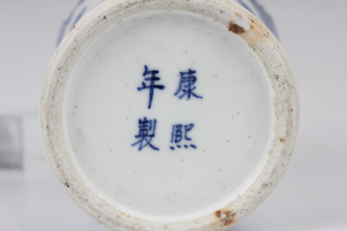 A Chinese blue and white porcelain vase, mark of Kangxi but late 19th century, the baluster body - Image 3 of 10