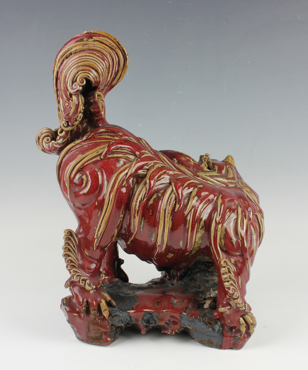 A Chinese Shiwan pottery sang-de-boeuf glazed figure group of a Buddhistic lion and playful cub, - Image 11 of 15