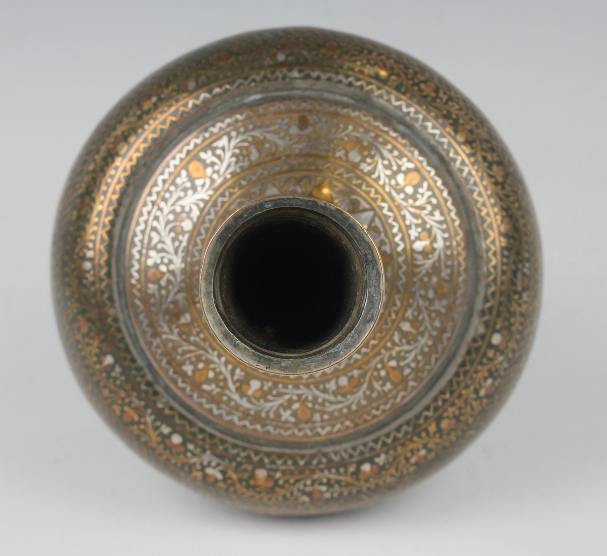 An Indian inlaid and silvered brass bottle vase, late 19th/early 20th century, the globular body and - Image 5 of 8