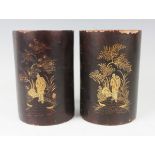 A pair of Chinese Canton lacquered bamboo brushpots, mid-19th century, each gilt with opposing