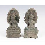 A pair of South-east Asian green patinated bronze figures of Buddha, seated in dhyanasana on a
