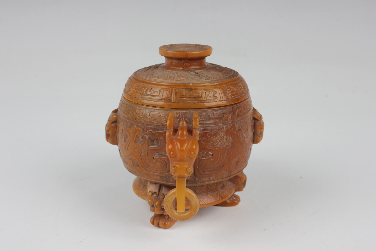 A Chinese archaistic butterscotch coloured soapstone tripod censer and cover, late Qing dynasty, the - Image 27 of 30