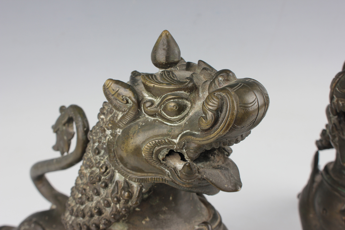 A pair of South-east Asian bronze models of Buddhistic lions, probably Nepalese, late 19th - Image 3 of 13