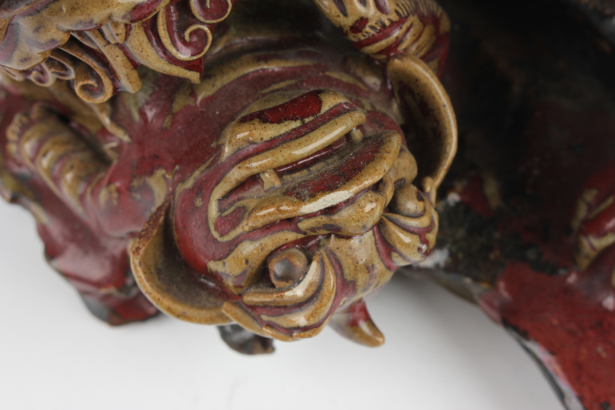 A Chinese Shiwan pottery sang-de-boeuf glazed figure group of a Buddhistic lion and playful cub, - Image 14 of 15