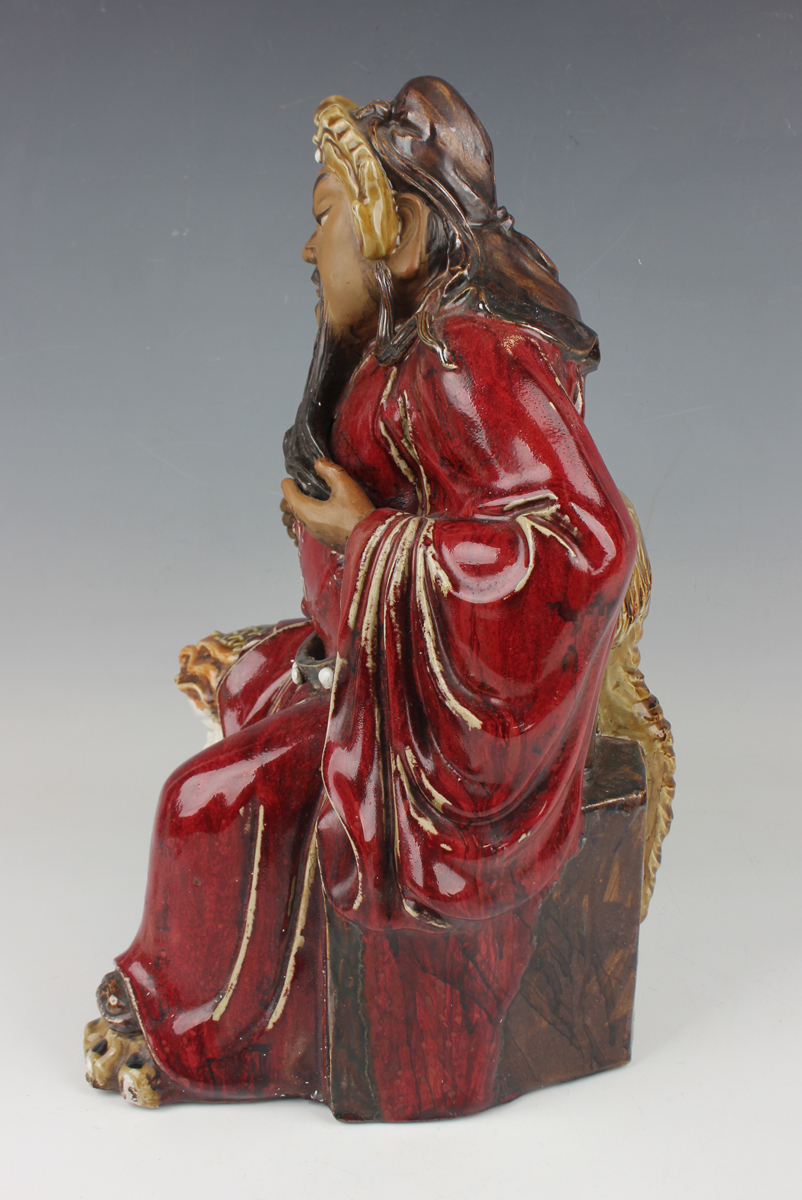 A Chinese Shiwan pottery sang-de-boeuf glazed figure of Guan Yu, mid-20th century, modelled seated - Image 4 of 7