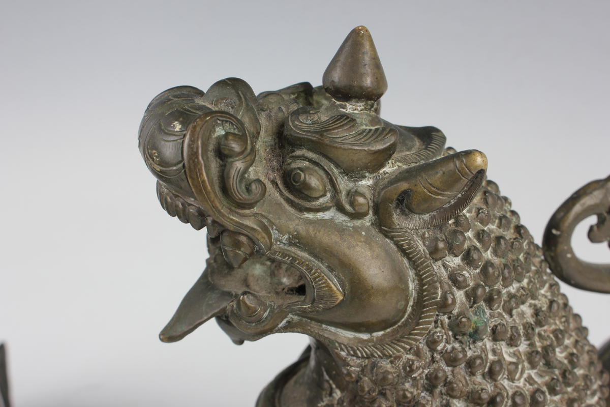 A pair of South-east Asian bronze models of Buddhistic lions, probably Nepalese, late 19th - Image 2 of 13