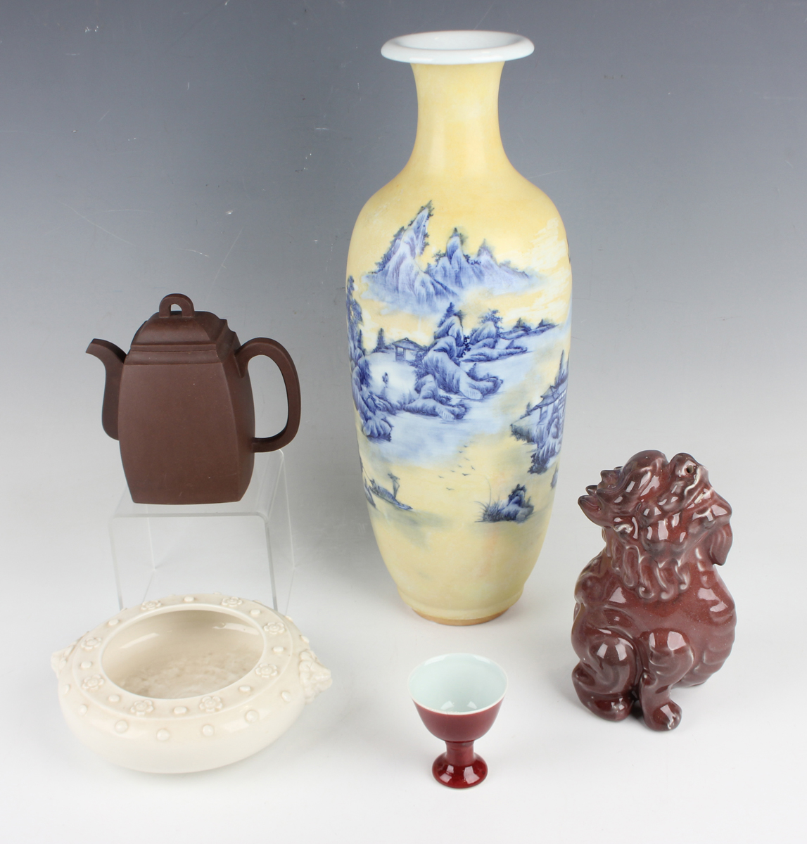 A small group of Chinese pottery, mostly 20th century and later, comprising a Yixing stoneware