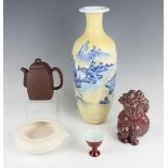 A small group of Chinese pottery, mostly 20th century and later, comprising a Yixing stoneware