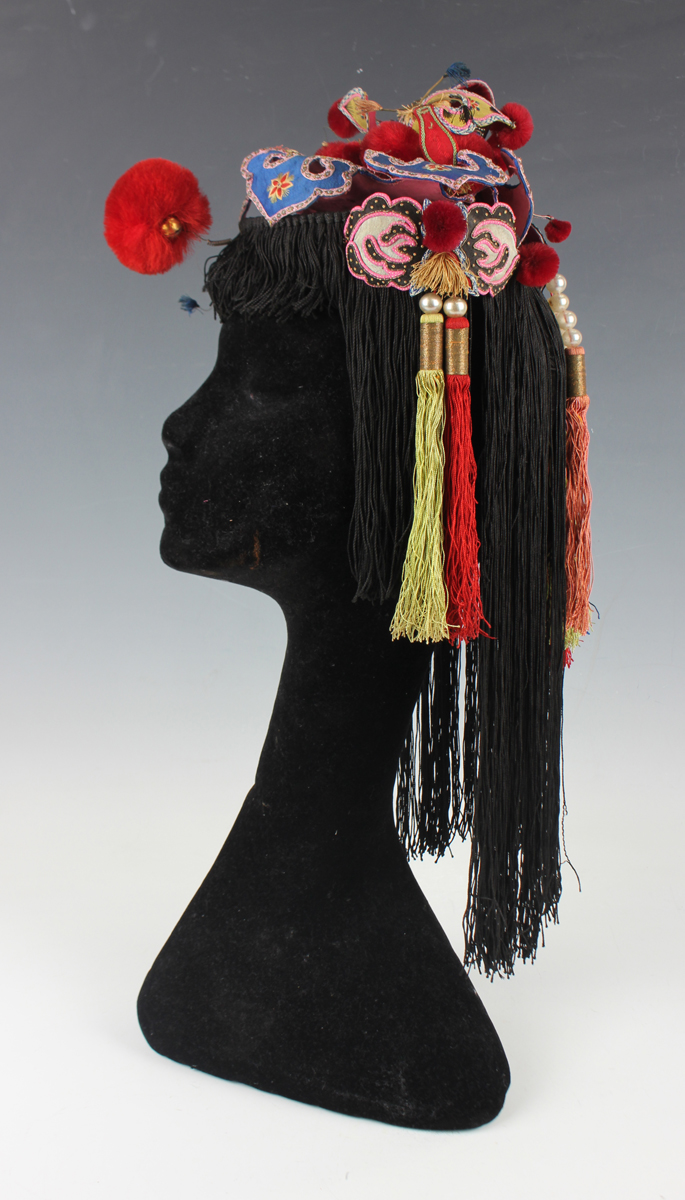 A Chinese silk embroidered child's festival hat, early 20th century, probably Yunnan Province,