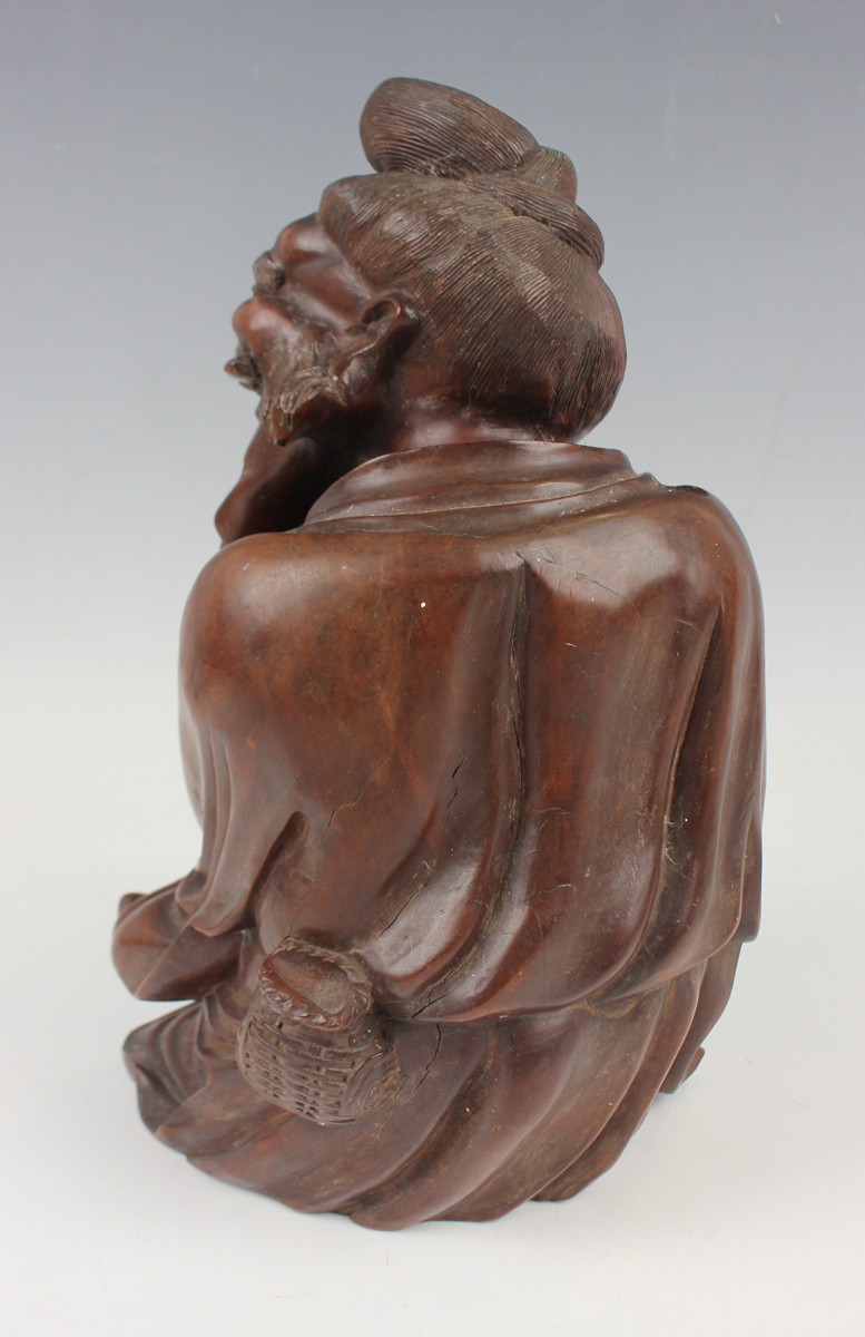 A Chinese hardwood figure of an elderly gentleman, early 20th century, modelled in a seated pose, - Image 13 of 15