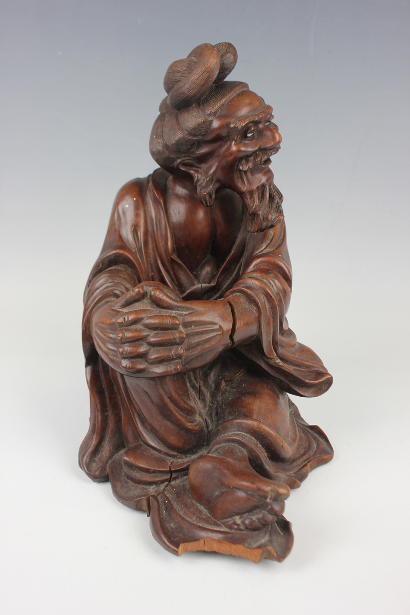 A Chinese hardwood figure of an elderly gentleman, early 20th century, modelled in a seated pose, - Image 10 of 15