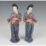 A pair of Chinese famille rose enamelled porcelain figures of maidens by Wei Hong Tai, late Qing