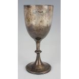 An Edwardian silver goblet, the 'U' shaped body above a beaded knop stem, on a circular beaded foot,