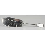 A George III silver Fiddle pattern fish slice with star and crescent pierced decoration, London 1817