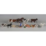 A collection of Britains and other plastic farm and wild animals, including cows, bull, shire horses